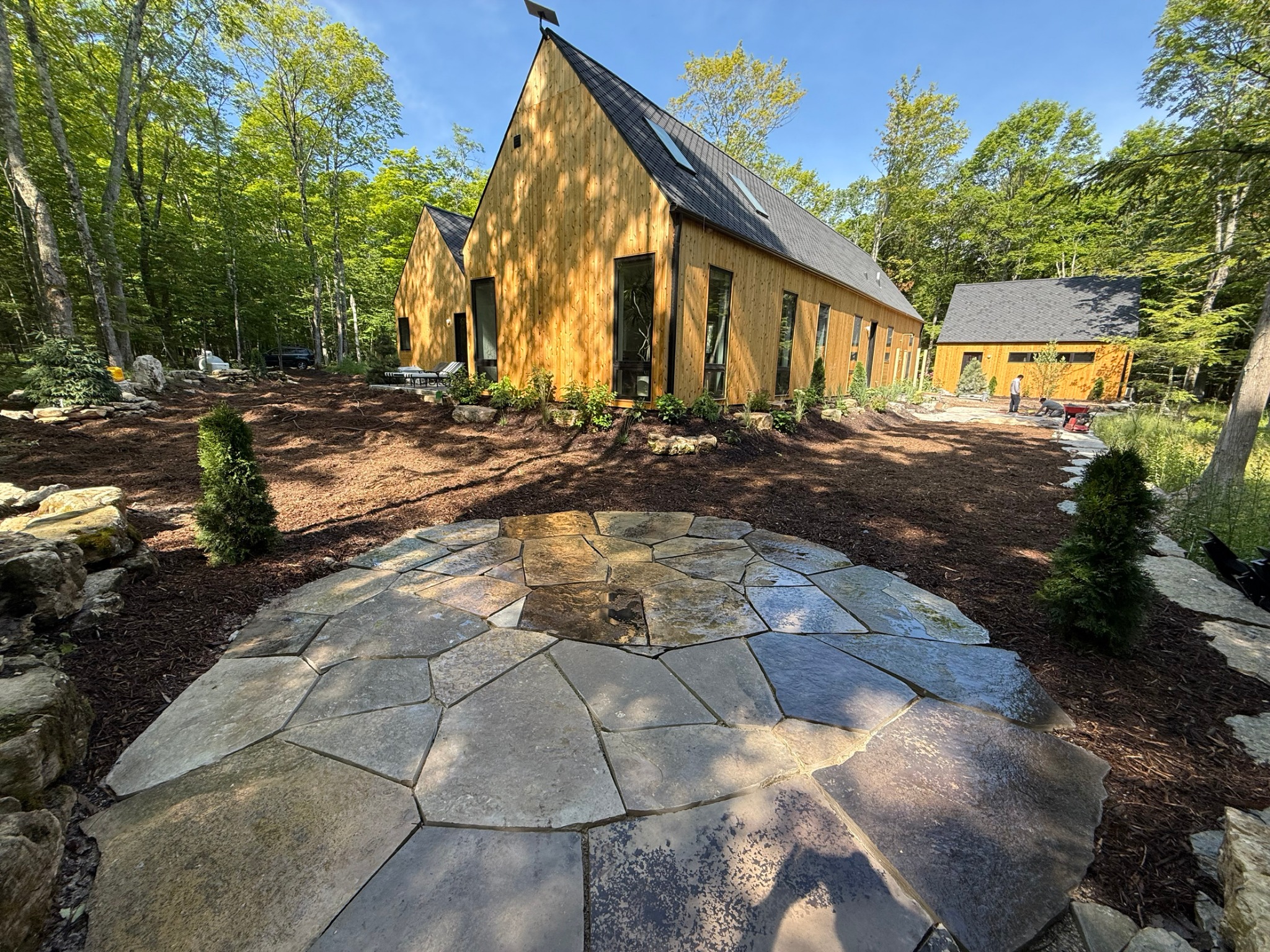Natural flagstone patio at a wooded Door County home